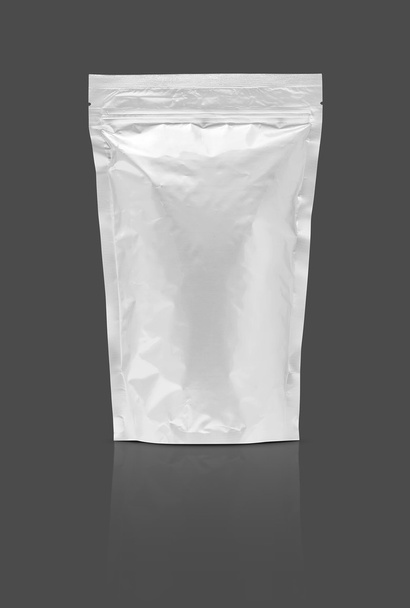 blank packaging aluminium foil pouch isolated on gray background - Fotoğraf, Görsel