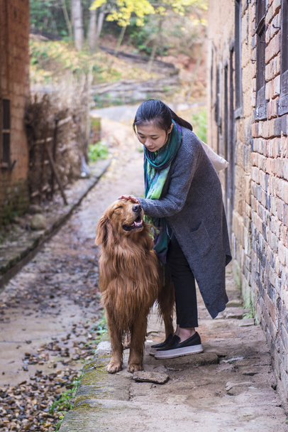 Girl and her pet dog - 写真・画像