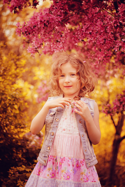child girl in spring garden - Φωτογραφία, εικόνα