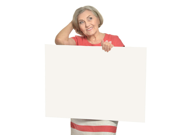 Mujer mayor con blanco
 - Foto, imagen