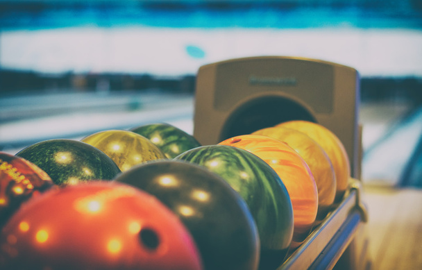 Close-up view of balls in bowling club. - Zdjęcie, obraz