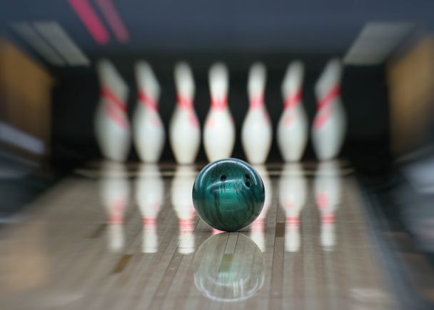 Bowling ball going into the pins. Motion blur. - Foto, Imagen