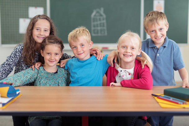 Smiling group of classmates in primary school - Foto, Bild