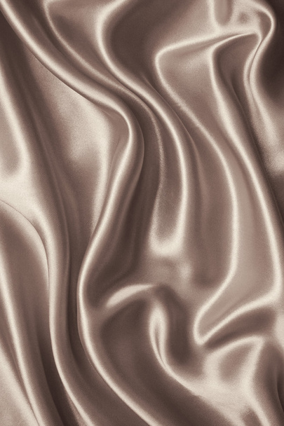Smooth elegant brown silk or satin as background. In Sepia toned - Фото, изображение