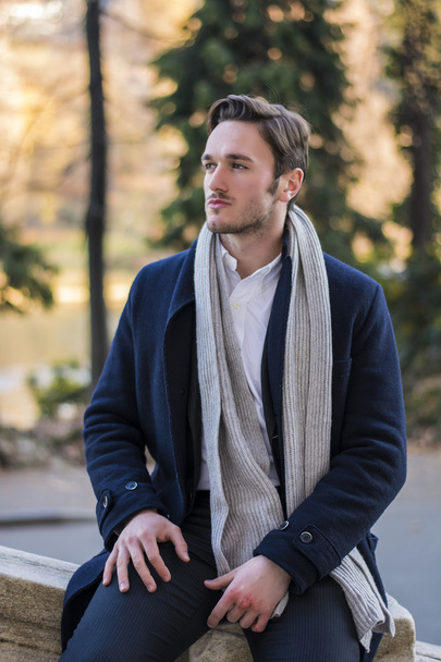 Handsome young man outdoor in winter fashion - Photo, Image