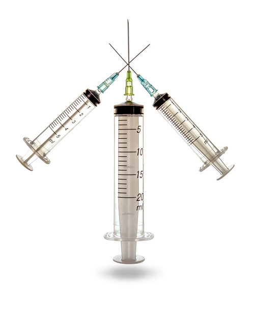 Three syringes with crossed needles - Photo, Image