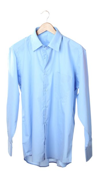 Blue shirt on wooden hanger isolated on white - Fotó, kép