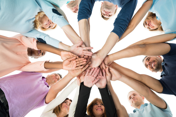Business Team Stacking Hands In Huddle - Photo, Image