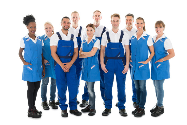 Group Portrait Of Confident Janitors - Foto, afbeelding