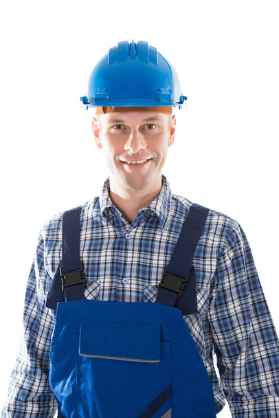 Portrait Of Smiling Construction Worker - Foto, afbeelding
