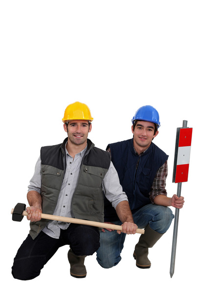 Duo of workman posing in studio - Foto, Imagen