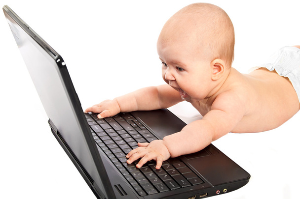 Little baby with laptop. - Zdjęcie, obraz
