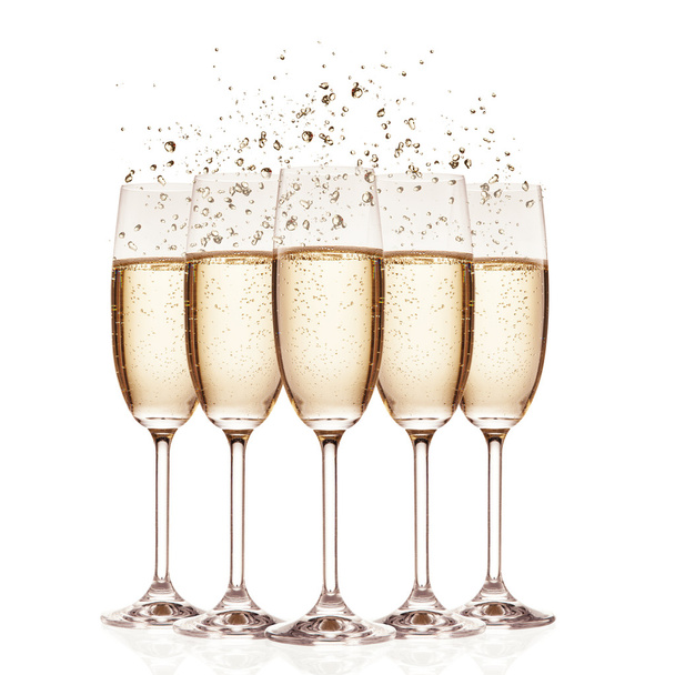 Glasses of champagne with bubbles, isolated on white - Fotoğraf, Görsel