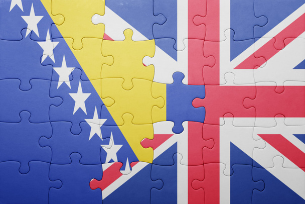 puzzle with the national flag of great britain and bosnia and herzegovina - Fotó, kép