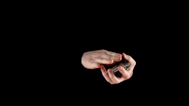 Juego de cartas truco de la magicina, en negro, cámara lenta
 - Imágenes, Vídeo