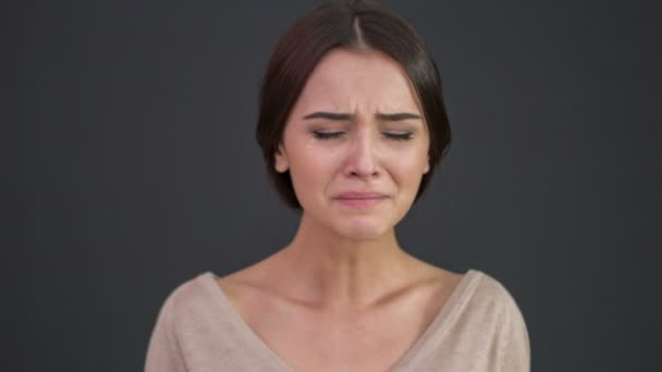 Young woman is sobbing severely. - Felvétel, videó
