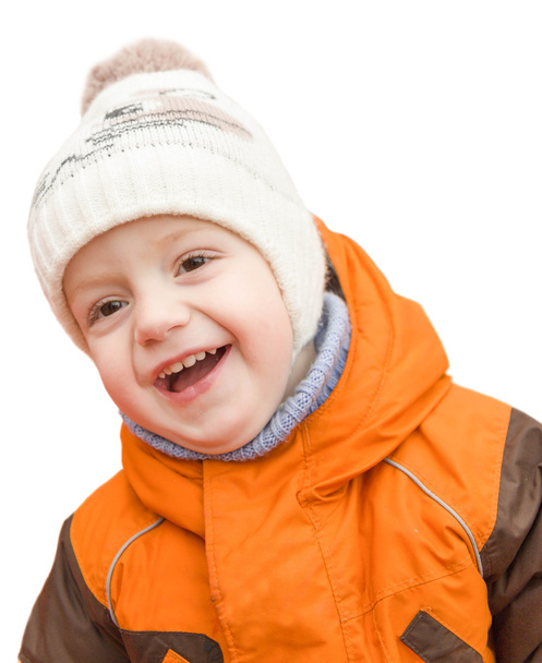 Портрет смеющегося ребенка в кепке и пиджаке, изолированном на
  - Фото, изображение