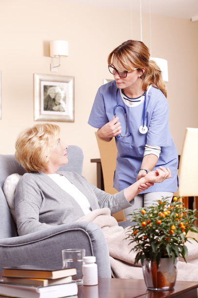 woman  accepting caregiver assistance. - Photo, Image