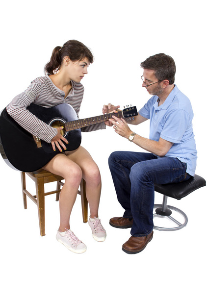teacher tutoring female play guitar - Foto, Bild