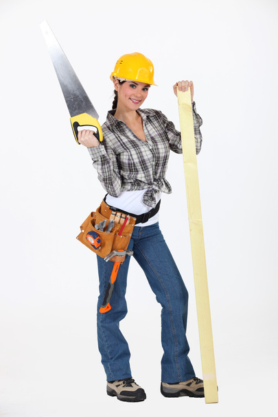 A sexy female carpenter. - Zdjęcie, obraz