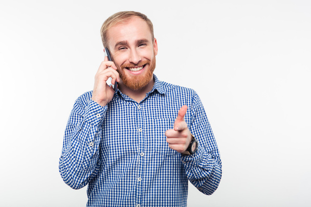 Smiling man talking on the phone - Photo, Image