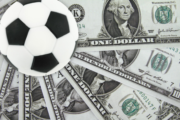 Fútbol y dinero
 - Foto, Imagen