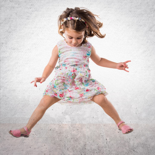Girl jumping in studio - Photo, Image