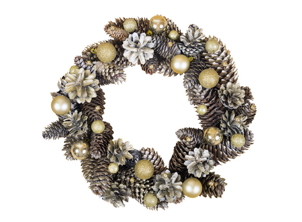 Christmas wreath of cones and balls on white background. - Fotó, kép