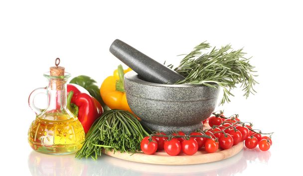 Rosemary in mortar, tomatoes cherry on wooden board, paprika and green onio - Photo, Image