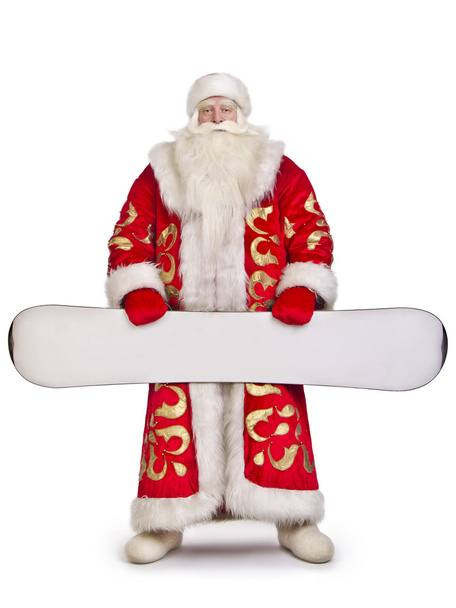Le Père Noël garde son snowboard
 - Photo, image