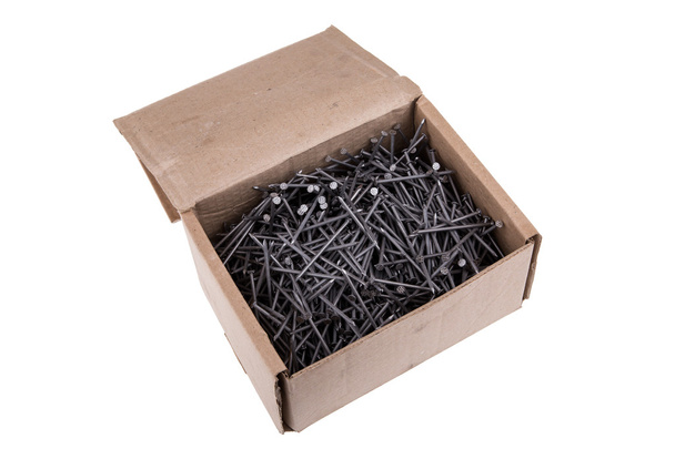 Nails in a box on a white background - Photo, Image