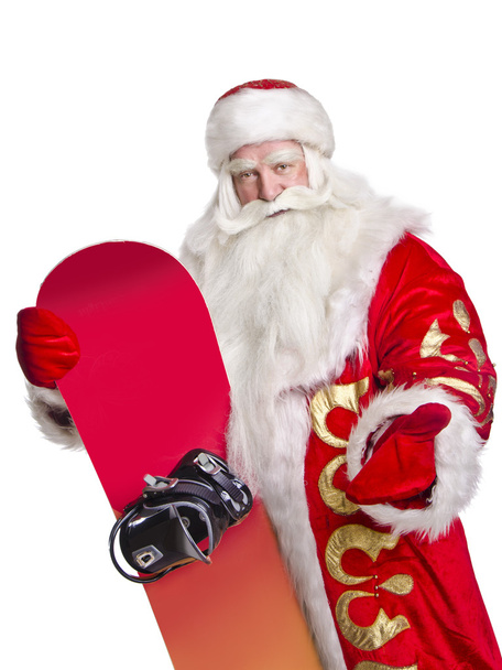 Santa Claus is giving the snowboard - Foto, Imagen