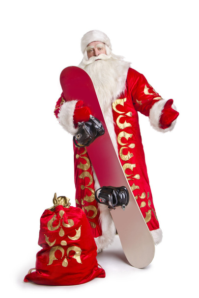 Santa is keeping his snowboard - Photo, image