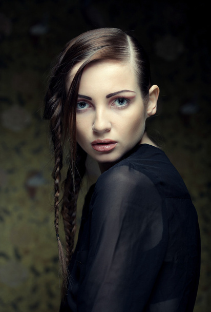 portrait of beautiful young blonde woman with creative braids ha - 写真・画像