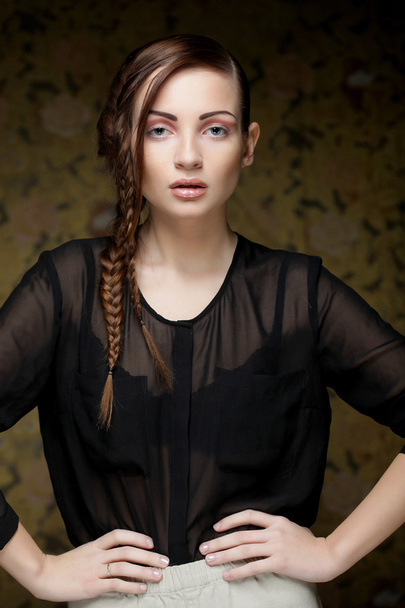 Beautiful fashion model with a creative hairstyling - Фото, изображение