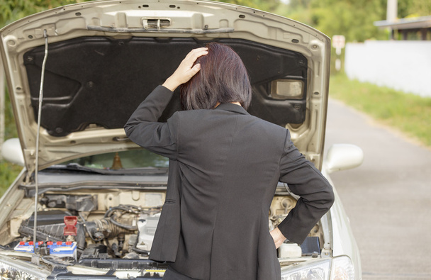 business woman with her broken car. - Photo, Image