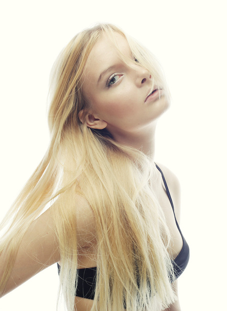 Beautiful woman with long  blond hair. - Valokuva, kuva