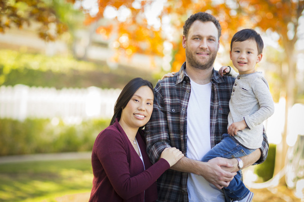 Mixed Race Young Family Portrait Outdoors - Photo, Image