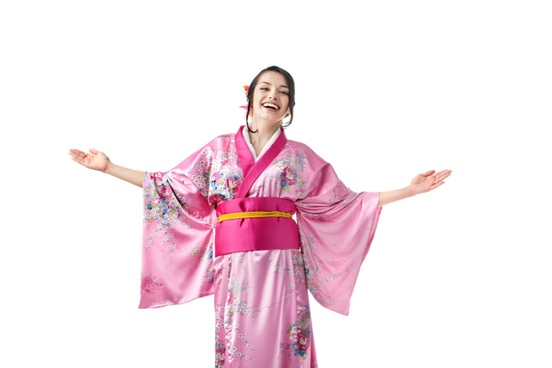 Friendly Young Woman in Kimono Dress. Advertising Space - 写真・画像