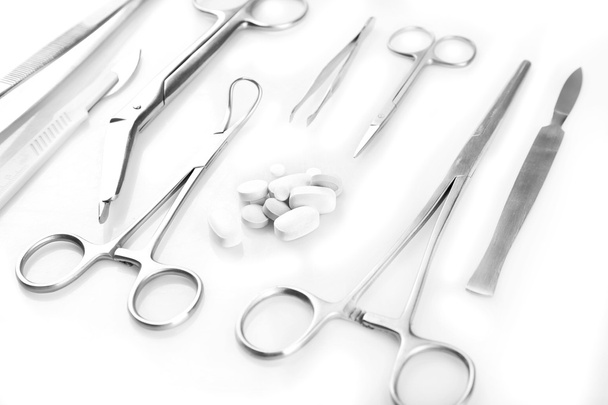 Surgery instruments on white - Fotó, kép