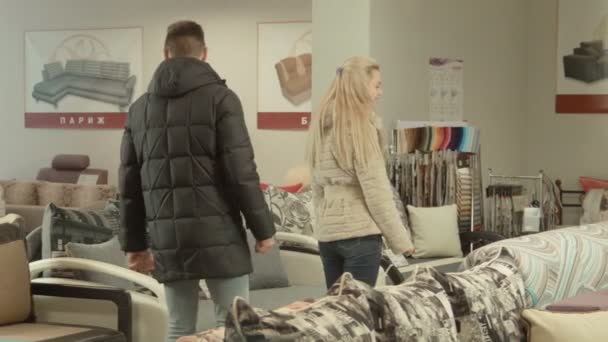 The couple chooses furniture - Footage, Video