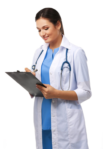 Smiling medical doctor holding a folder - 写真・画像