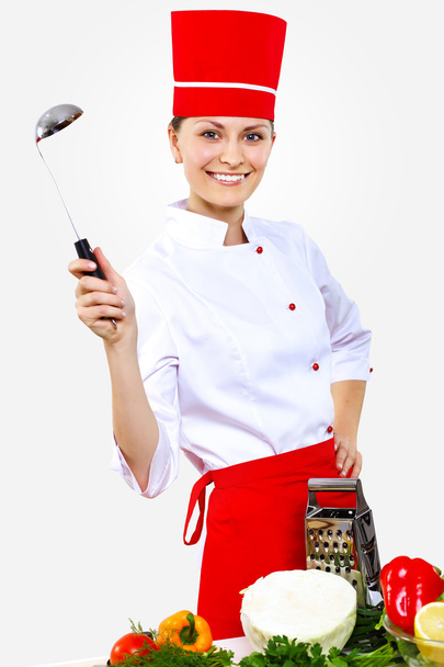 Portrait of a young cook in uniform - Foto, Imagem