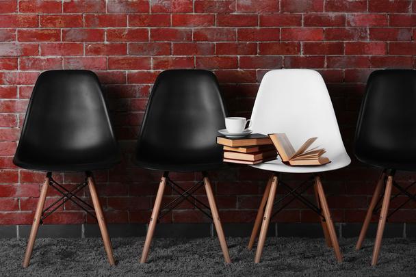 chairs with books and cup of coffee - Фото, зображення