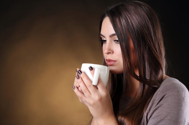 Portrait of pretty woman with cup of coffee - Foto, Imagem