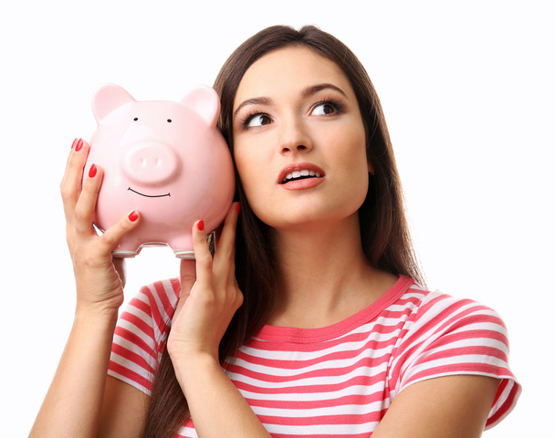 Woman with pig money box  - Zdjęcie, obraz