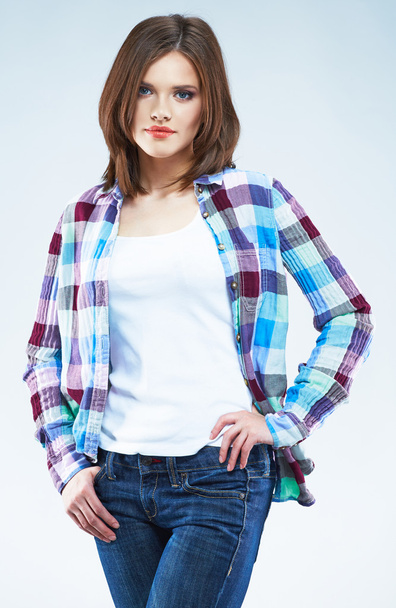 Woman posing in checkered shirt - Foto, afbeelding