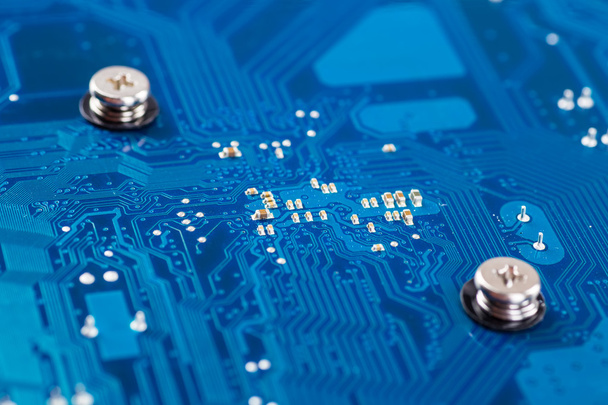 blue circuit board background of computer motherboard - 写真・画像