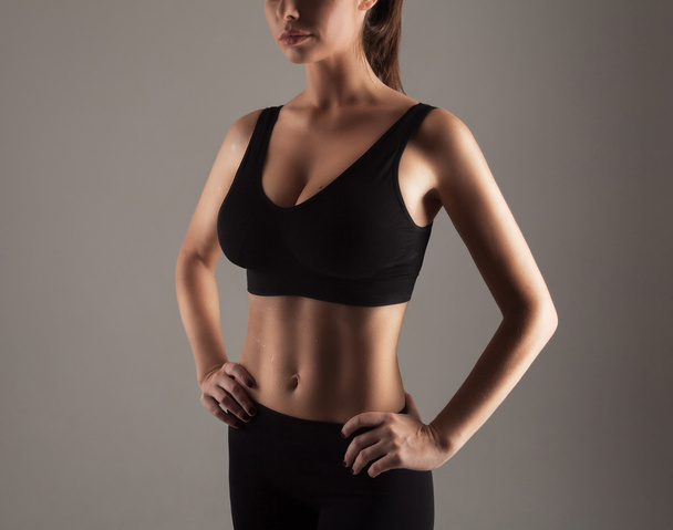 Model in sports leggins and top - Foto, imagen