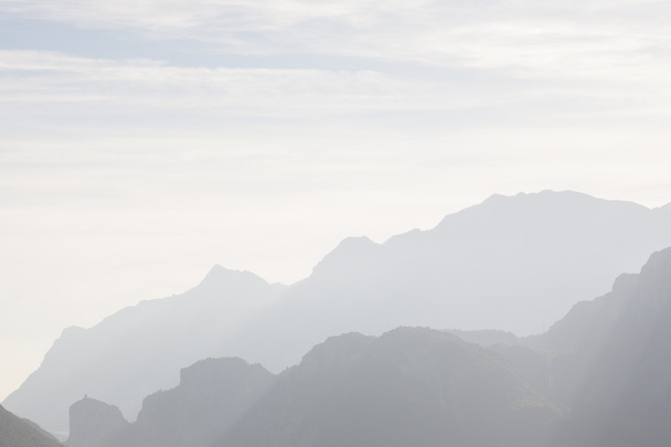 Mountain silhouettes in Arco - Foto, Imagen